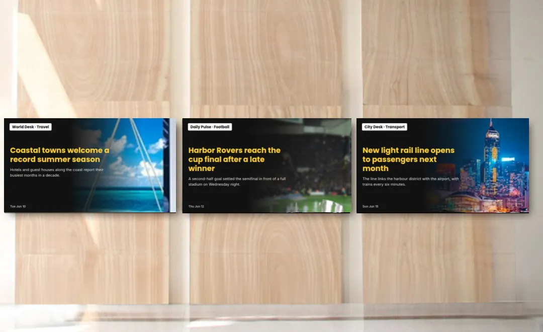 Three news cards on screens along a wooden wall.